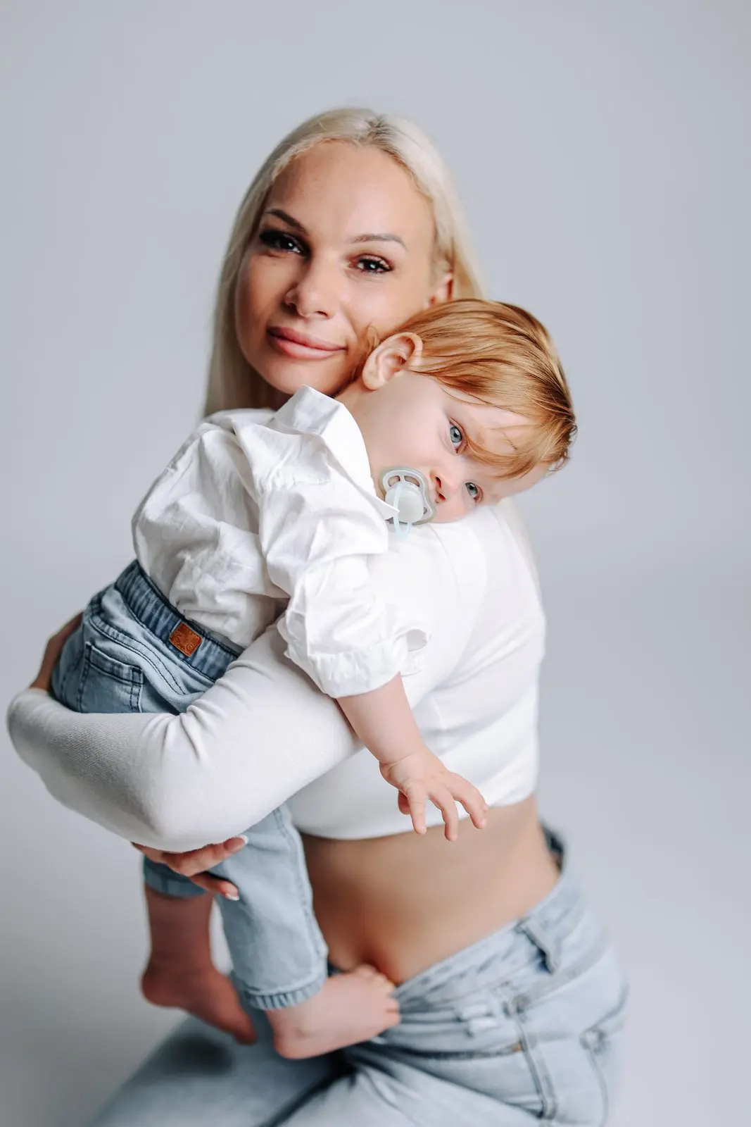 Family studio photography in matching outfits