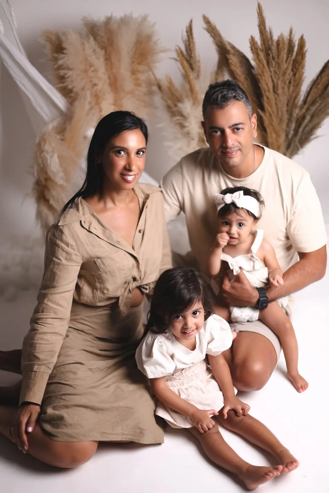 Family studio portraits on dark background