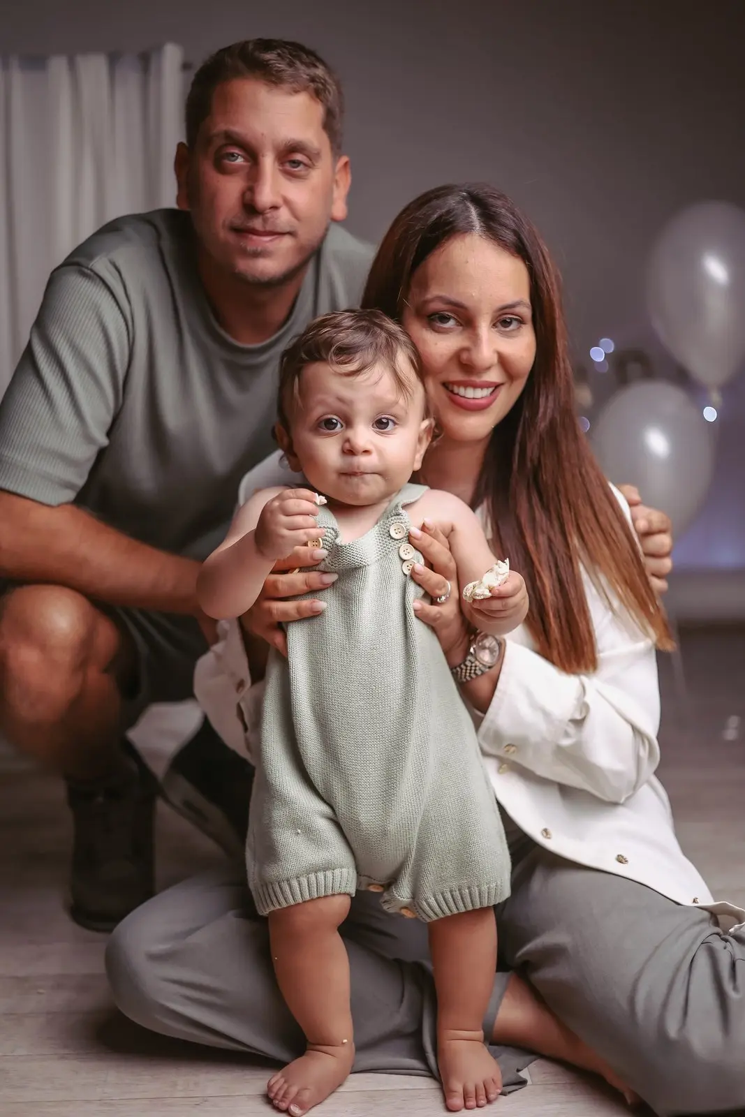Happy parents captured in studio photography