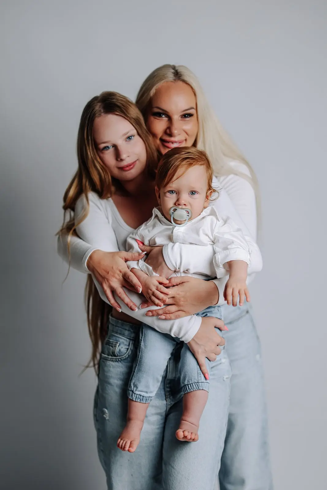 Emotion-filled family studio portraits